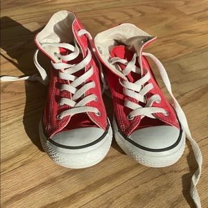 Red converse high top sneakers